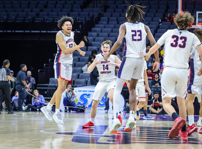 The Crusaders celebrate their Sac-Joaquin Section championship 68-63 win over Lincoln at the Golden 1 Center.